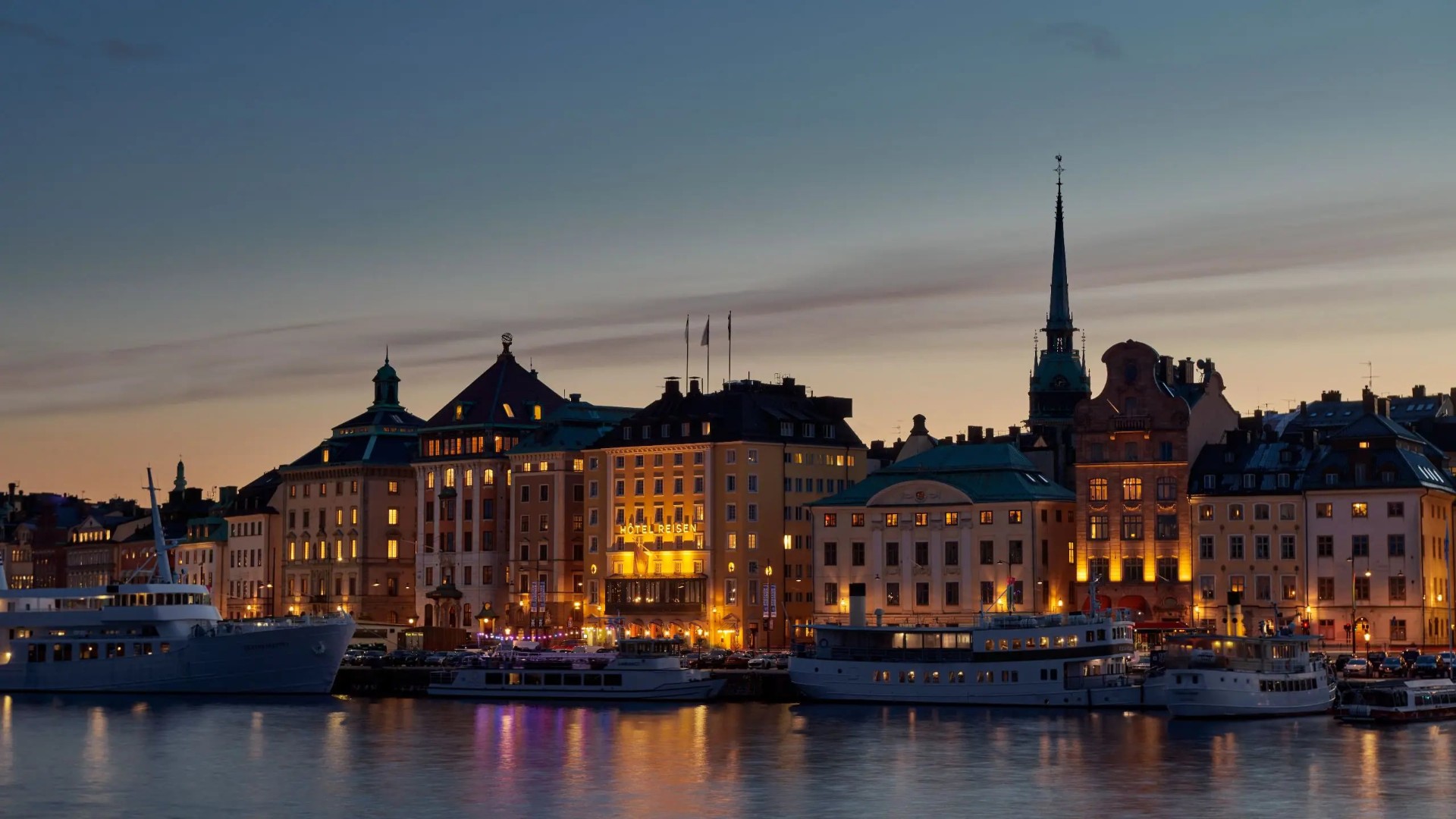 Stockholm's Gamla Stan waterfront glowing at dusk