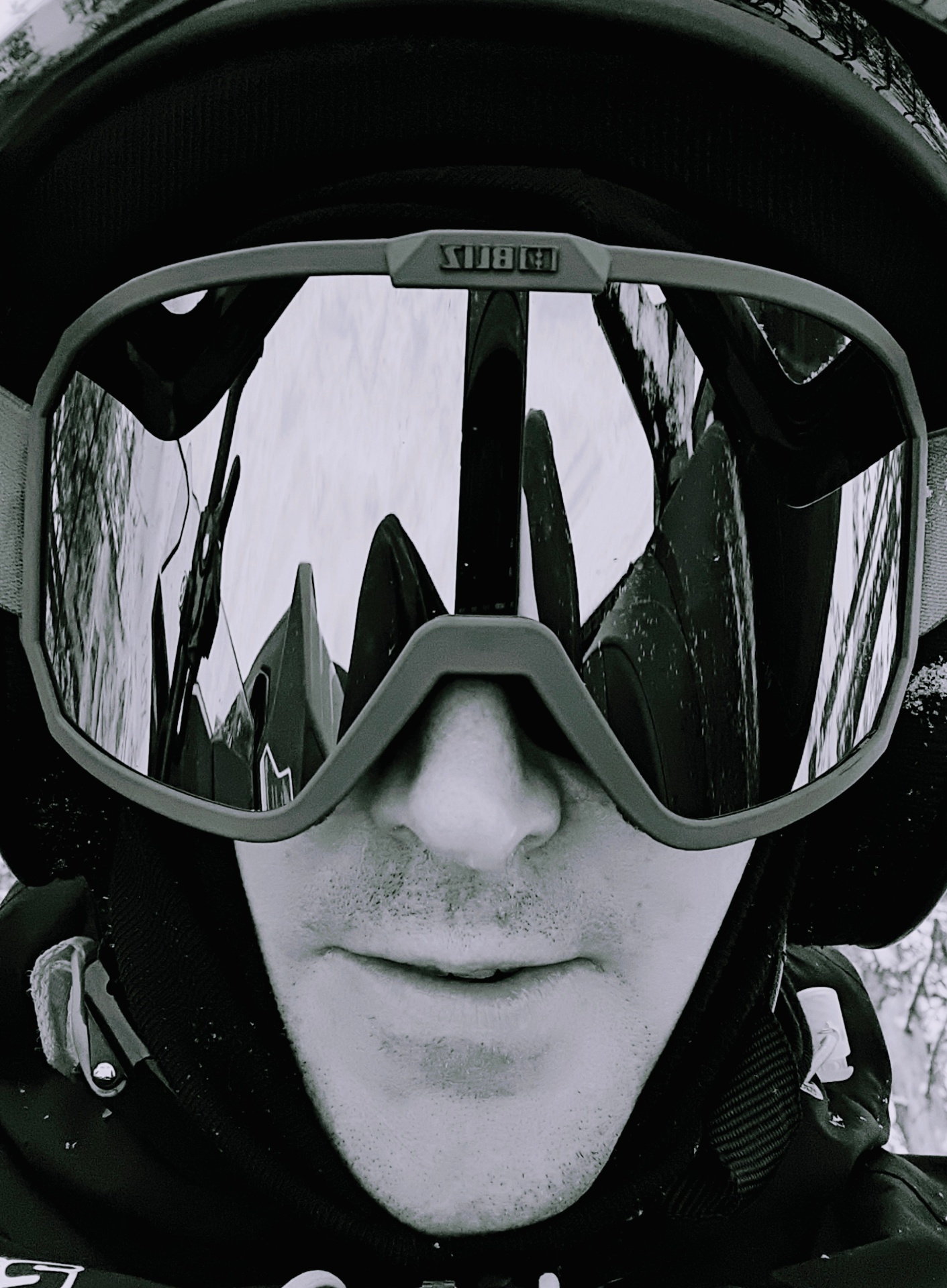 First-hand view of a skier in goggles in the Nordic mountains